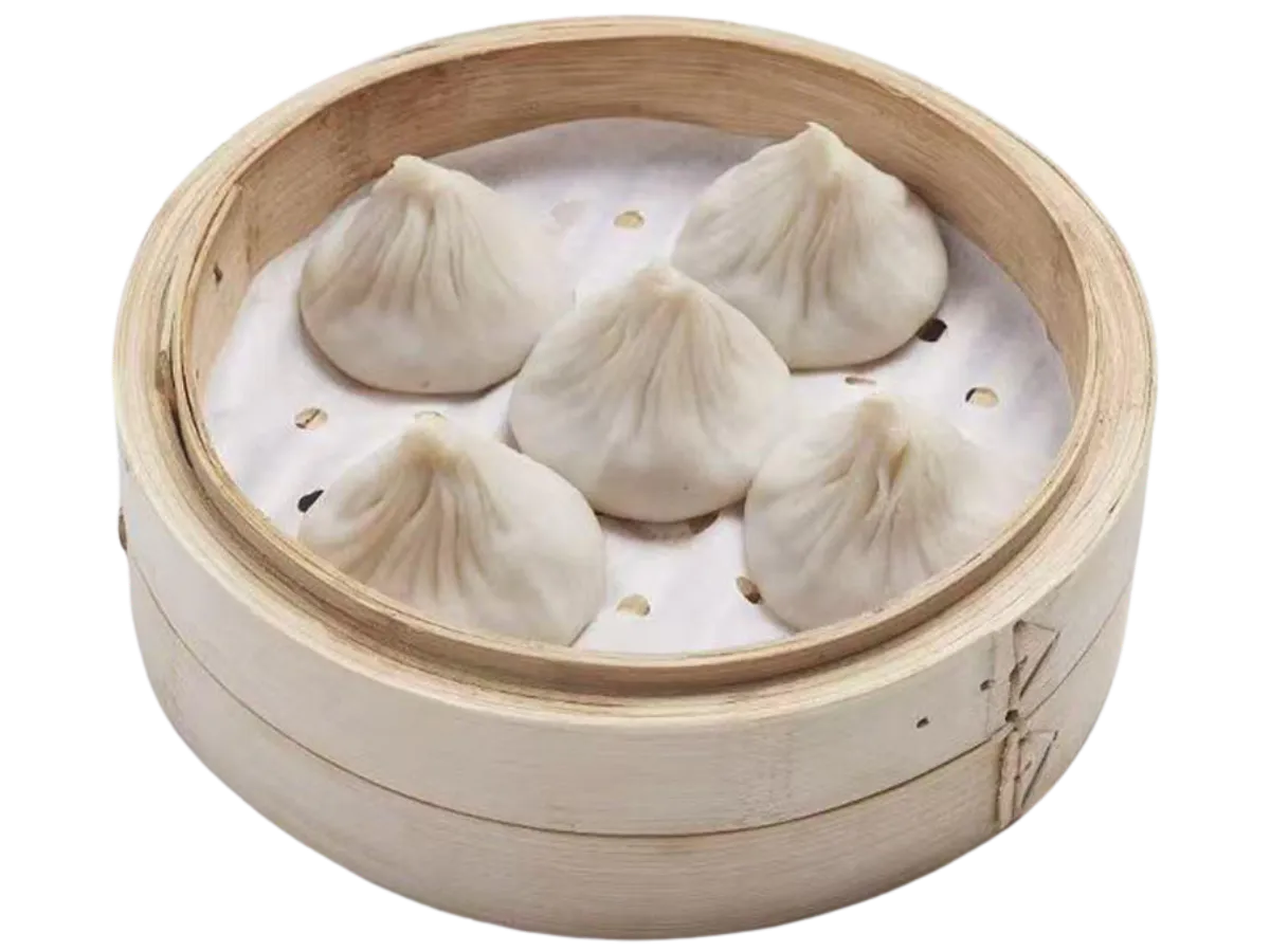 Original pork soup dumplings in bamboo steamer at Hui Jiang Nan Dumpling Eatery, a Dumpling Restaurant in Minneapolis